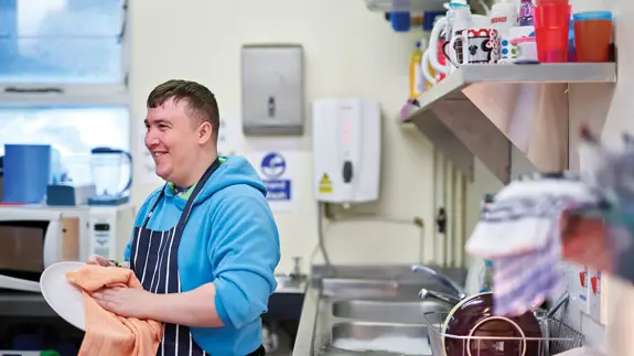 Man Working In Kitchen